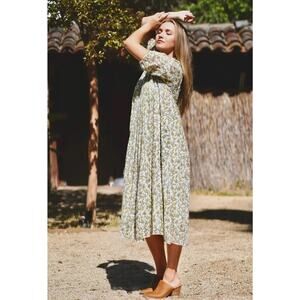 Hand made dress made with organic cotton that was block printed in India by hand